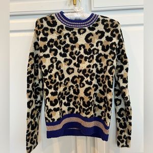Cozy, soft with bling for the holidays. Barely worn. XS but fits a S as well.
